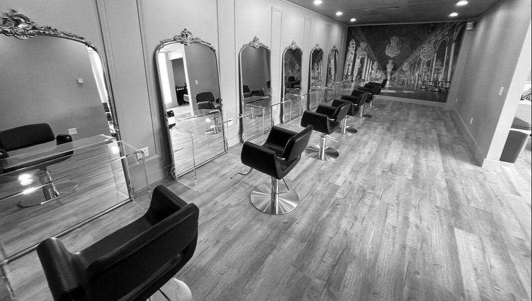 Full-Service AVEDA hair salon in Bloomington, IL, Offering Custom Cuts, Color, Makeup, and Extensions